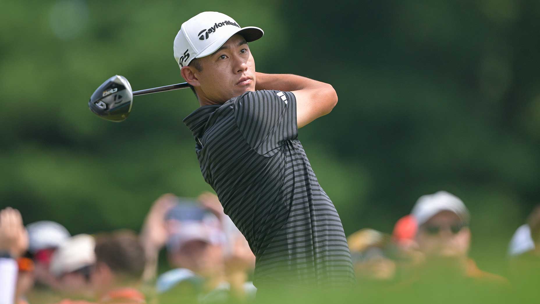 Collin Morikawa watches a shot during the 2025 Travelers Championship.