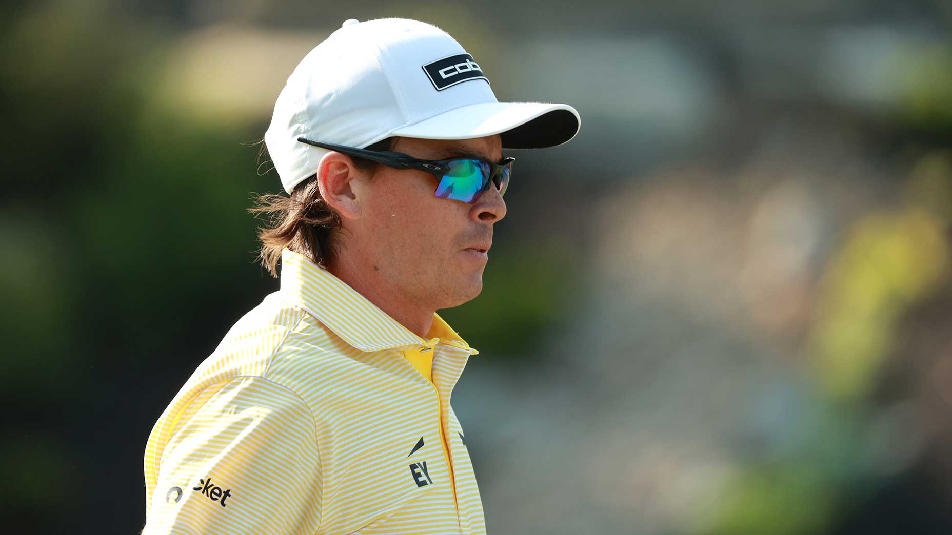 Rickie Fowler looks on at the 2025 Memorial.