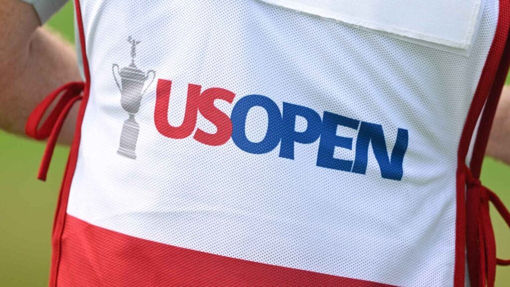 PGA Tour pro Sam Burns' caddie's bib seen during the 2025 U.S. Open.